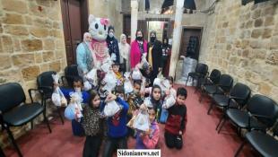 بالصور : الإتحاد العربي للمرأة المتخصّصة يرسم البسمة على وجوه الأطفال في لبنان
