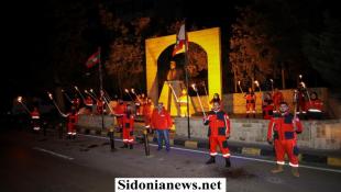 بالصور : فوج الإنقاذ الشعبي يضيء المشاعل تحية للشهيد معروف سعد في الذكرى 48 لاستشهاده